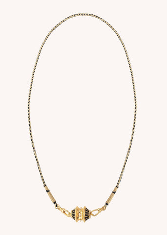 Unleash your inner strength and elegance with the MYA-BAY Big Talisman Black necklace. Gilded with 24-carat fine gold and made from 100% recycled gold and silver, this mystical talisman offers protection and positivity in a timeless and sophisticated design. The black enamel adds an alluring touch of mystery to any outfit.

CO-274 G