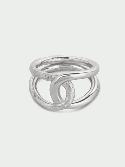 Tutti & Co Alder Ring in Silver A silver-toned multi-band ring with a textured matte finish and polished smooth bands, shown on a light gray background.