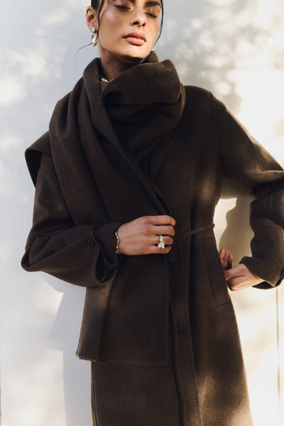 Levete Room Owa 33 Jacket in Coffee Melang Woman wearing a brown coat against a white background