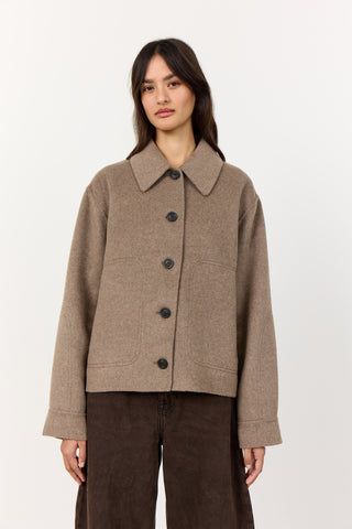 Levete Room Owa 25 Jacket in Cinder Melang Woman wearing a brown coat with  buttons on a white background