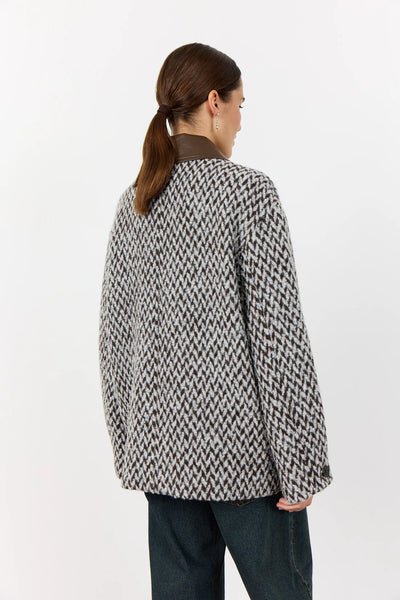 Levete Room Mai 1 Jacket in Coffee Combi Person wearing a patterned coat on a white background