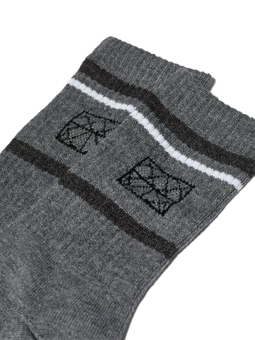 Heyanno Logo Socks Gray sock with black and white patterns on a white background