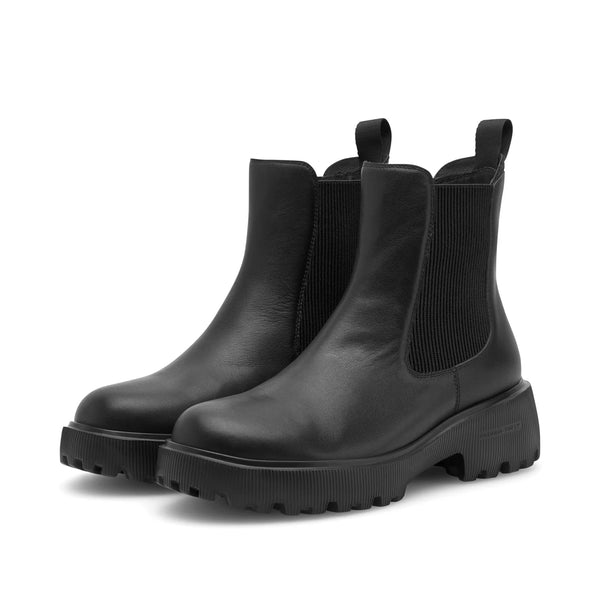Woden Aya L Boots in Black Pair of black leather Chelsea boots on a white background