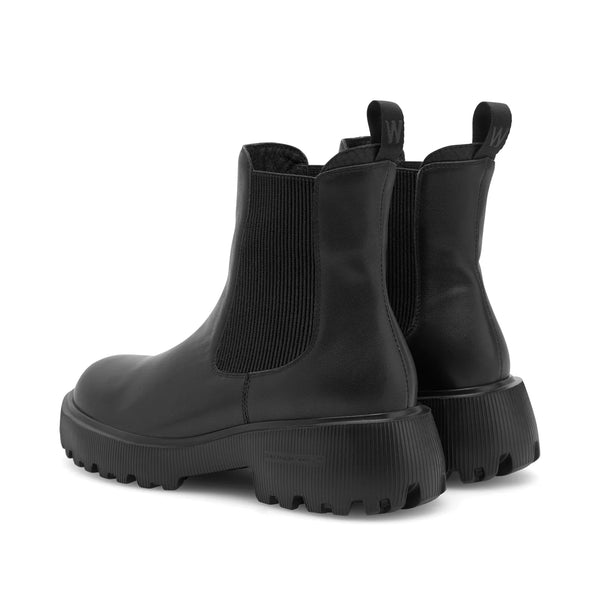 Woden Aya L Boots in Black Black Chelsea boots on a white background
