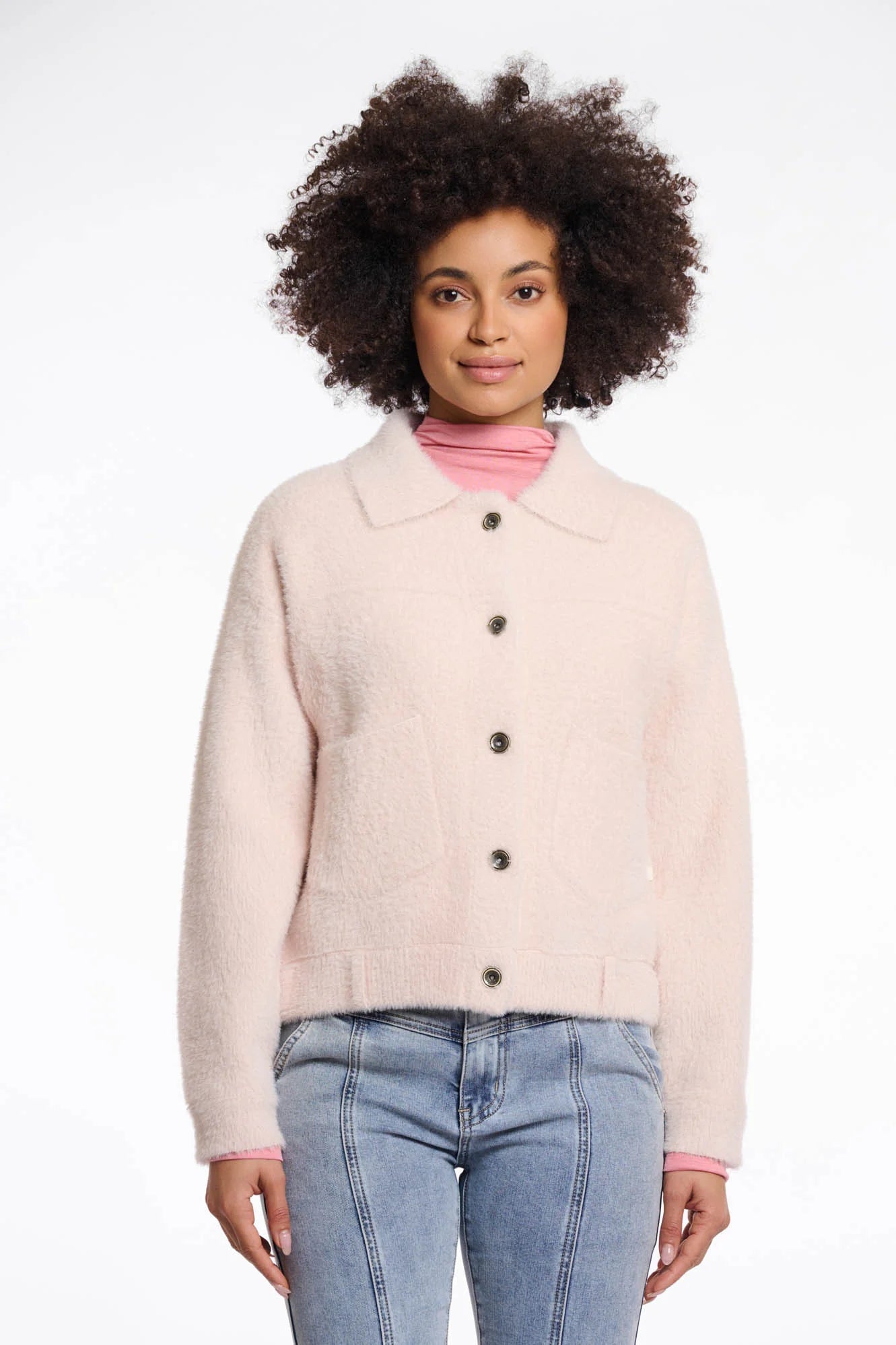 Rino & Pelle Bubbly Boxy Jacket in Pale Woman wearing a light pink jacket with a white background