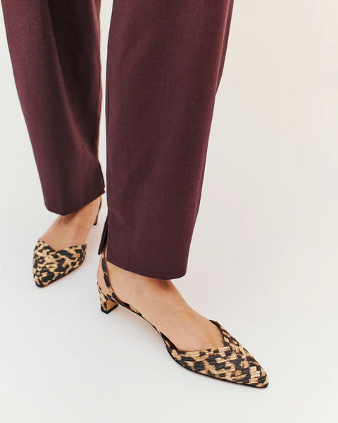 Anonymous Copenhagen Givia 40 Shoe in Leopard Leopard print shoes worn with burgundy pants on a white background