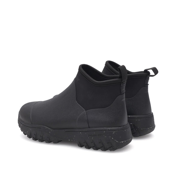 Woden Irene Waterproof in Black Black rubber boots on a white background