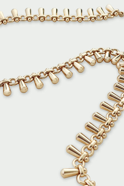 Tutti Dewdrop Necklace in Gold Gold chain necklace on a light gray background