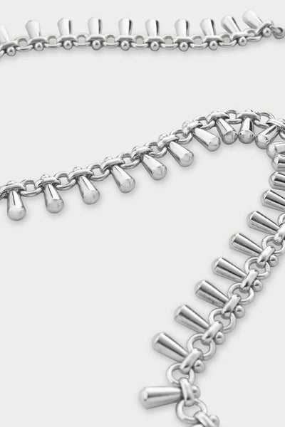 Tutti Dewdrop Necklace in Silver Silver chain bracelet on a light gray background