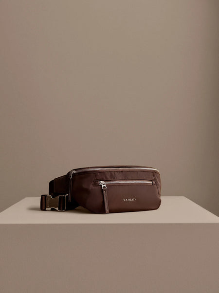 Varley Lasson Belt Bag in Coffee Bean. Brown waist bag with zippers.