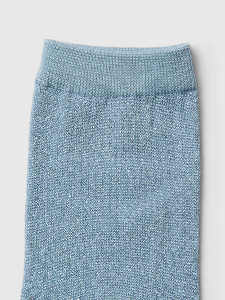 Selected Femme Knitted Glitter Sock - Dusty Blue Blue knitted sock on a light gray background