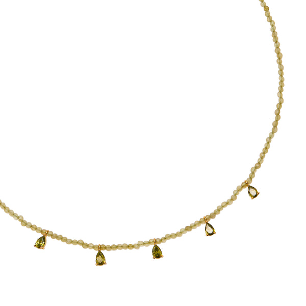 Talis Chains Beaded Necklace CZ Drop - Green Jade Delicate necklace with teardrop-shaped green gemstones on a thin gold chain against a white background.