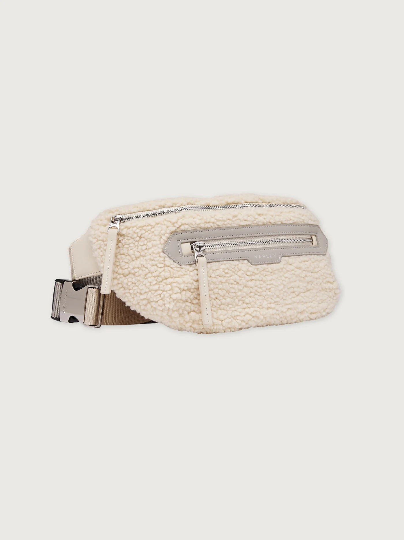 Varley Kansa Sherpa Belt Bag in Sandshell. White fleece waist bag with zippers.