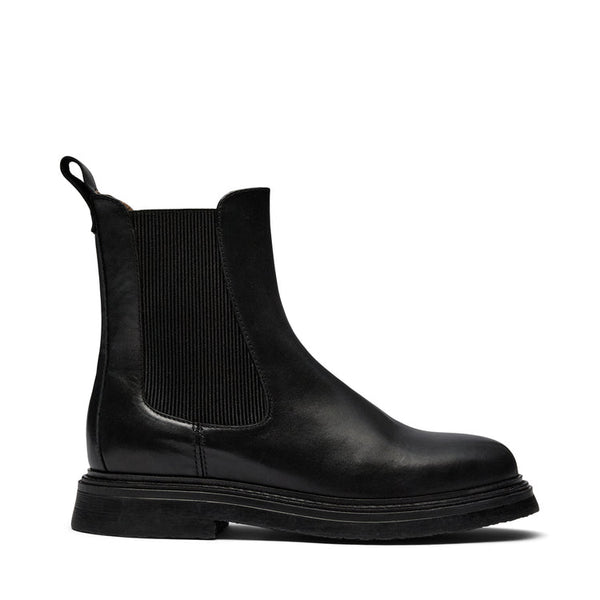 Pavement Margot Buffalo Boot in Black A single black leather Chelsea boot with a black elastic side gore and a pull tab, shown in a side profile on a white background.