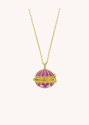 Introducing the Fuchsia Protection necklace by MYA-BAY. This elegant and mysterious necklace, gilded with 24k recycled fine gold, features a secret: its unique design allows you to hold a precious stone or charm (6x8mm). Customize it to become your personal talisman. Also available in a variety of colors for your preference.