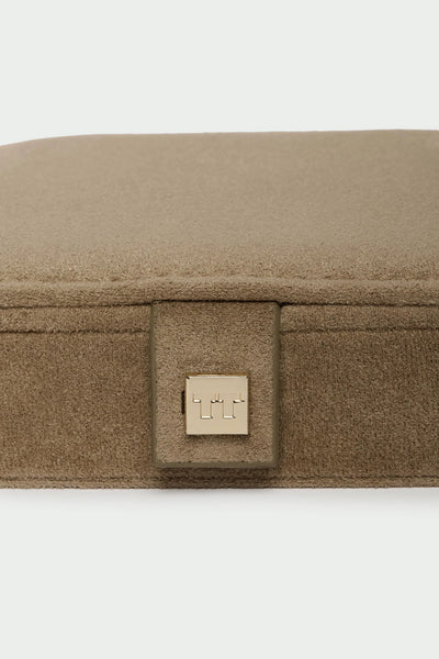 Tutti Sand Mini Suede Jewellery Box Close-up of a brown fabric product with a visible brand logo on a white background